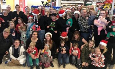 Children’s Down Syndrome project serenades shoppers to say thanks to the local community