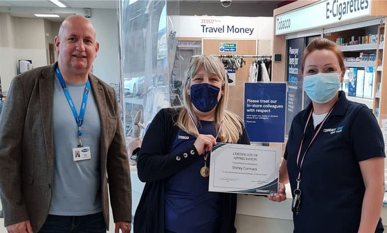 Store worker is handed inaugural Community Spirit Award